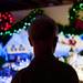 Charles Elkins looks over the North Pole display on Monday. He can control the lights and trains with remote controls. Daniel Brenner I AnnArbor.com